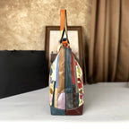 Large-capacity genuine leather women's crossbody bag with nautical-style design, perfect for casual and beach outings.