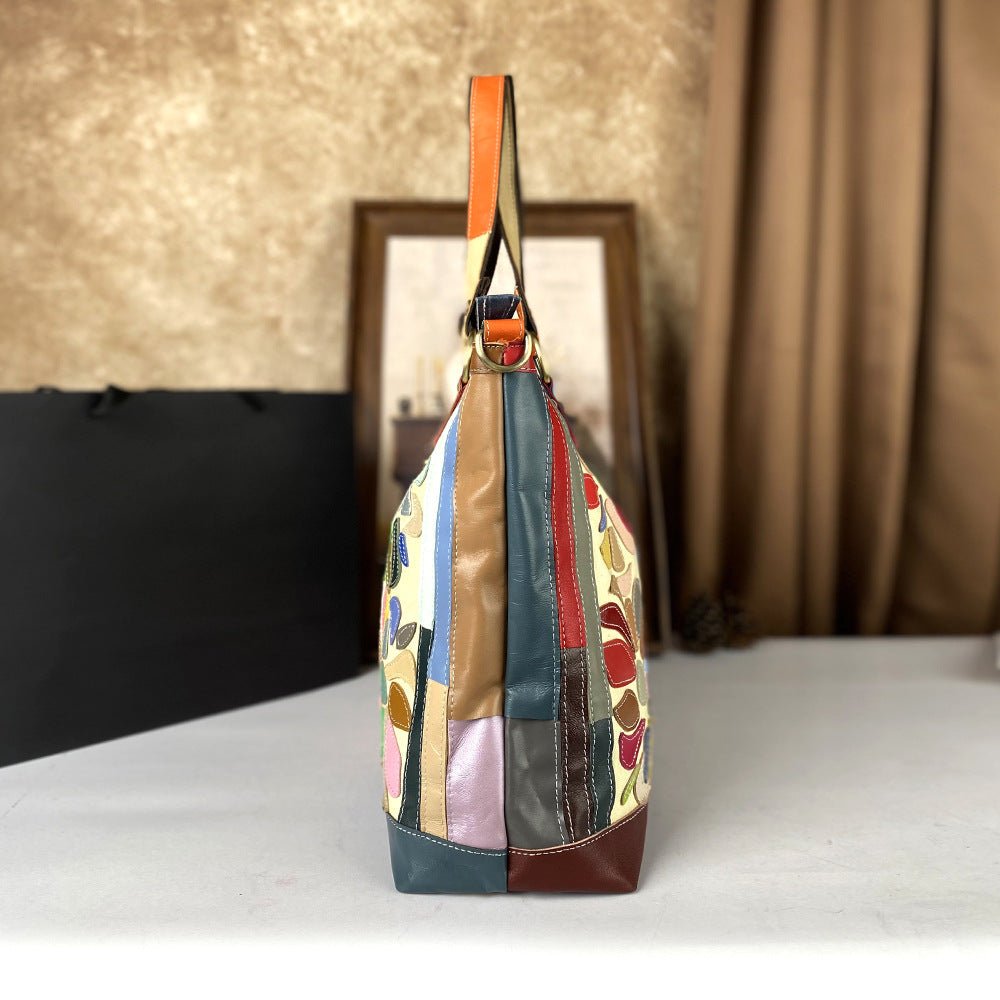 Large-capacity genuine leather women's crossbody bag with nautical-style design, perfect for casual and beach outings.