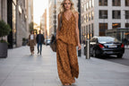 Women’s leopard print sleeveless top and chiffon pants set by FitiqueFit, casualwear with stylish animal print and flowy fabric.