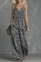 Women’s leopard print sleeveless top and chiffon pants set, casualwear by FitiqueFit, shown on a model with a stylish, relaxed look.