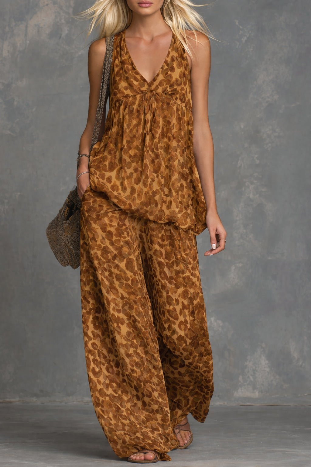 Women’s leopard print sleeveless top and chiffon pants set by FitiqueFit, casualwear ensemble with stylish animal print fabric.