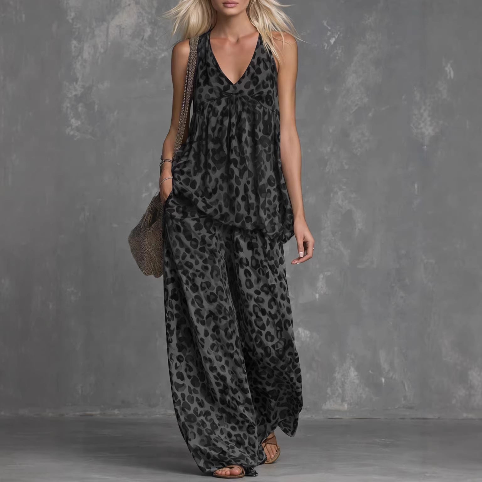 Women’s leopard print sleeveless top and chiffon pants set by FitiqueFit, casualwear ensemble featuring stylish animal print fabric.