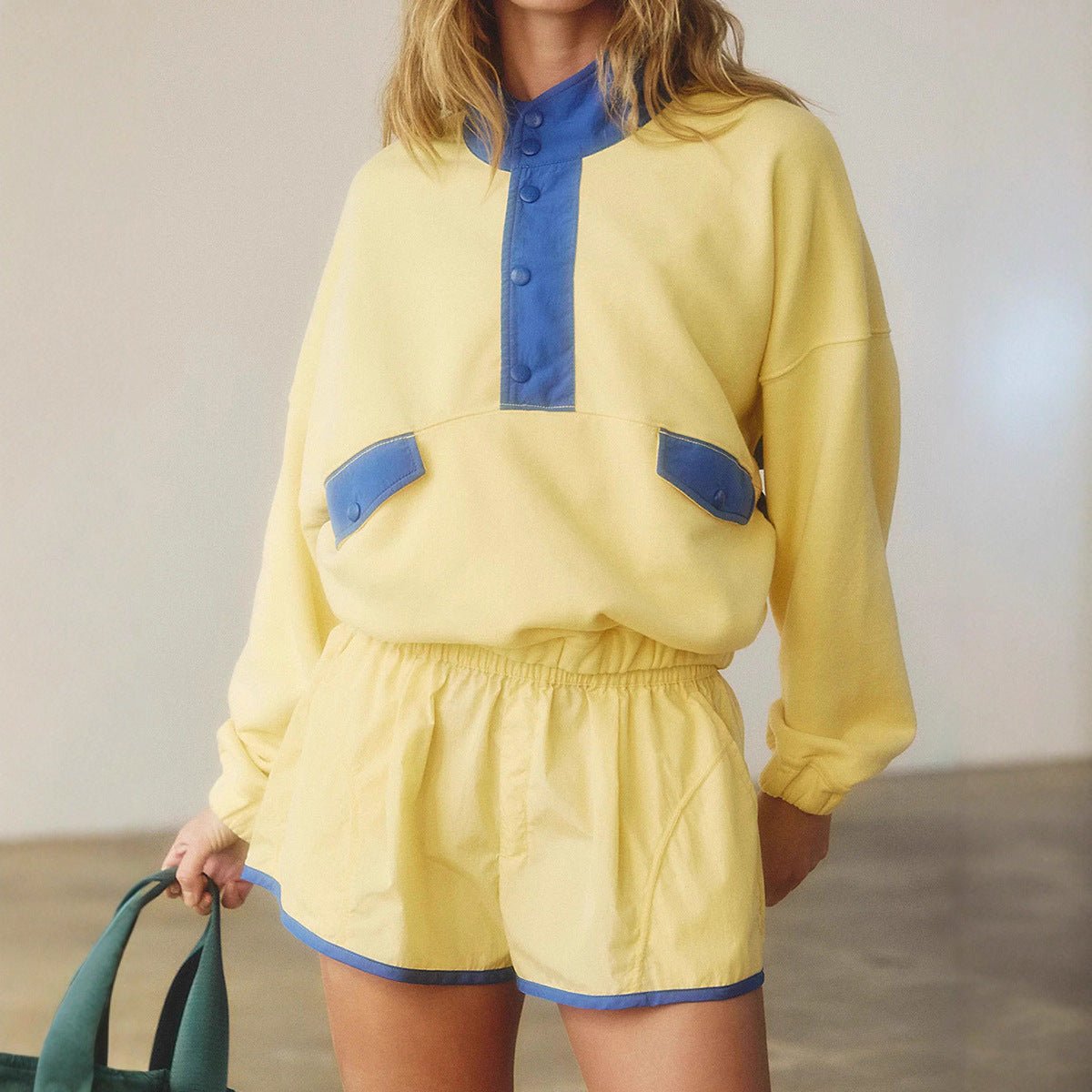 Women's long-sleeve contrast color 2-piece casualwear set with top and cropped pants from FitiqueFit.