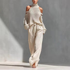 Women's long-sleeve turtleneck top and pants set by FitiqueFit, casualwear, featuring a stylish and elegant 2-piece outfit.