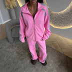 Women’s long-sleeve zip-up jacket and sweatpants two-piece set by FitiqueFit, featuring a cozy, casual athleisure look.