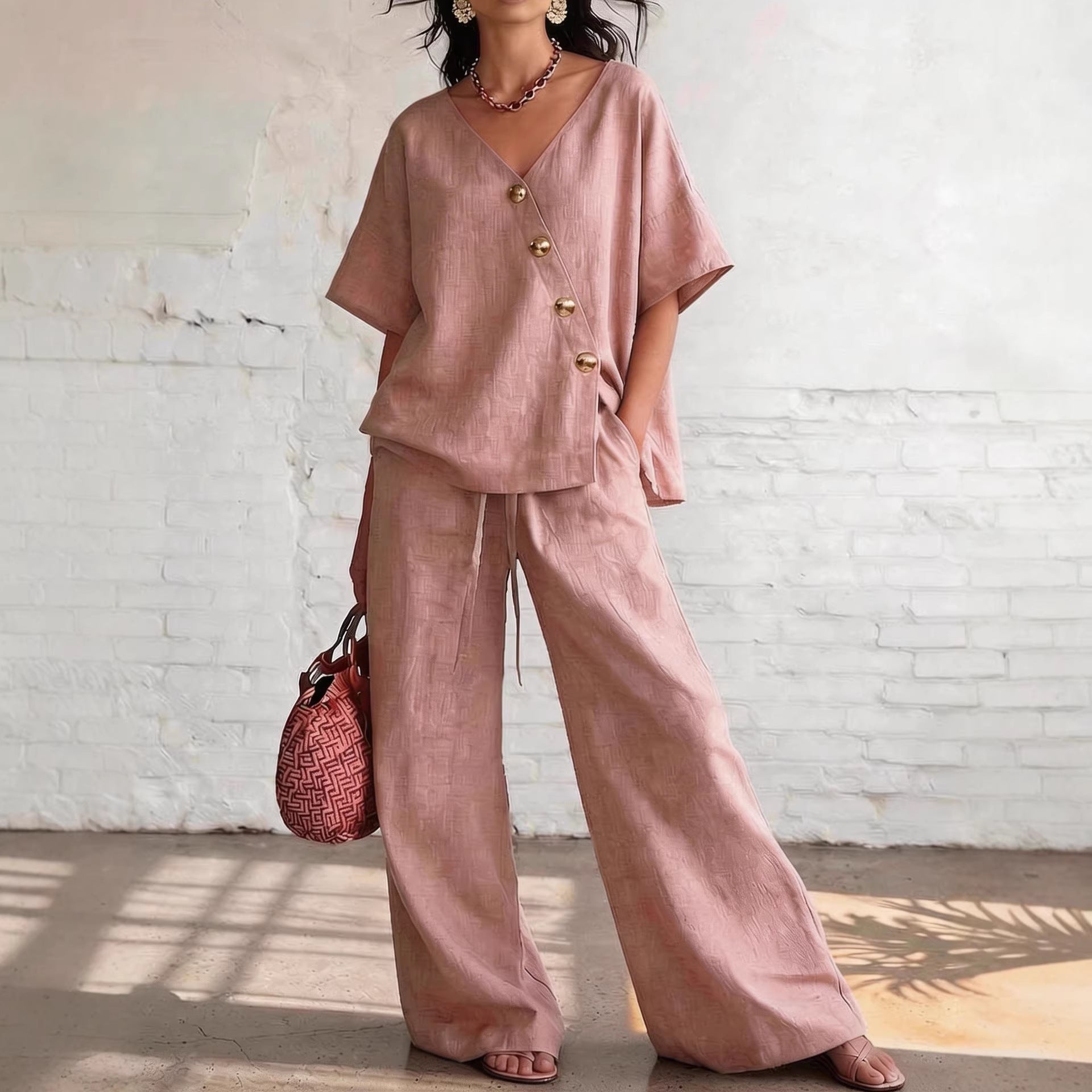 Women's loose cotton-linen V-neck top and wide-leg pants set by FitiqueFit, casualwear outfit with relaxed fit and breathable fabric.