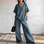 Women's loose cotton-linen V-neck top and wide-leg pants set by FitiqueFit, casualwear outfit, shown on a model.
