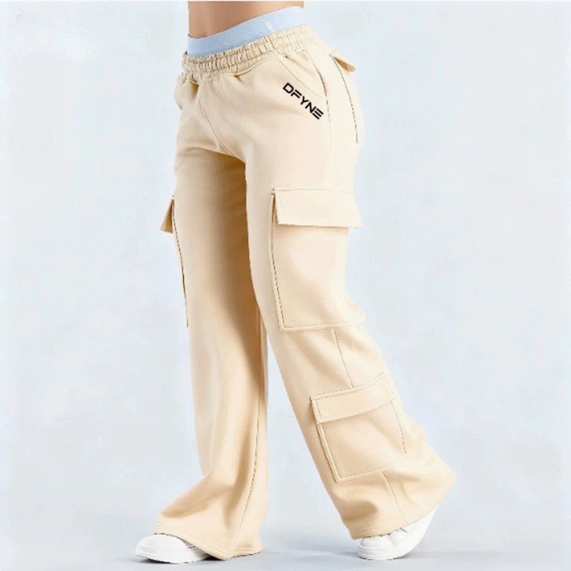 Women's loose-fit casual pants with pockets in solid two-tone color, from Plush Fashion Hub, shown with relaxed fit and stylish design.