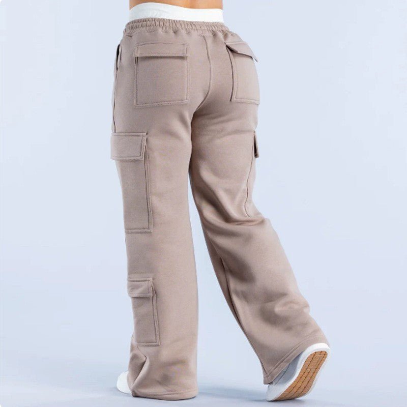Women's loose-fit casual pants with pockets in solid two-tone color, from Plush Fashion Hub, shown in a relaxed fit style.