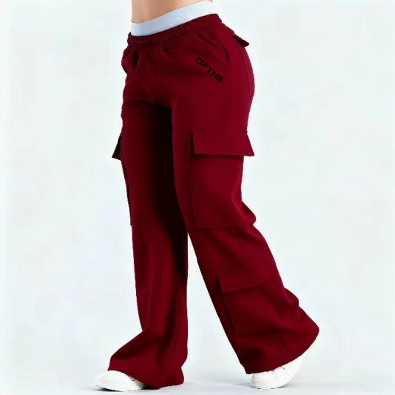 Women's loose-fit casual pants with pockets in solid two-tone color, by Plush Fashion Hub, ideal for comfortable everyday wear.