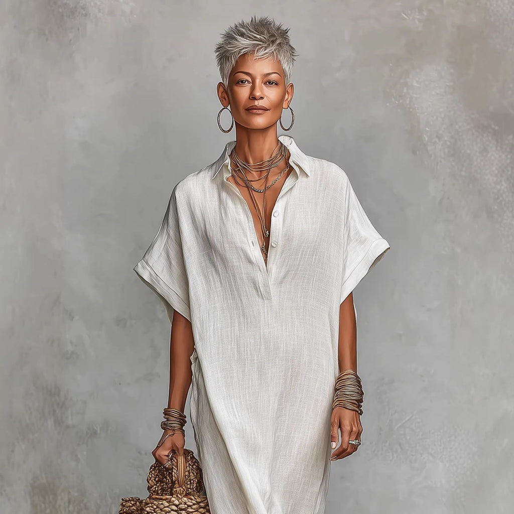 Women’s loose long batwing sleeve dress by FitiqueFit, casualwear with flowing fabric and relaxed fit, shown on a model.