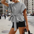 Women's loose-fit round-neck lace-up bow-knot short-sleeve casual top by FitiqueFit, shown in a stylish, relaxed fit design.