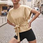 Women's loose round-neck lace-up bow-knot short-sleeve casual top by FitiqueFit, featuring a relaxed fit and stylish design.