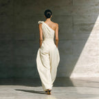 Women's loose sleeveless off-shoulder belted wide-leg jumpsuit by FitiqueFit, showcasing casualwear style with relaxed fit and wide legs.