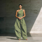Women's loose sleeveless off-shoulder wide-leg jumpsuit from FitiqueFit, featuring a belted waist and casual, relaxed fit.