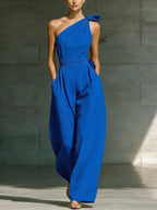 Women's loose sleeveless off-shoulder belted wide-leg jumpsuit in casualwear by FitiqueFit, shown on a model.