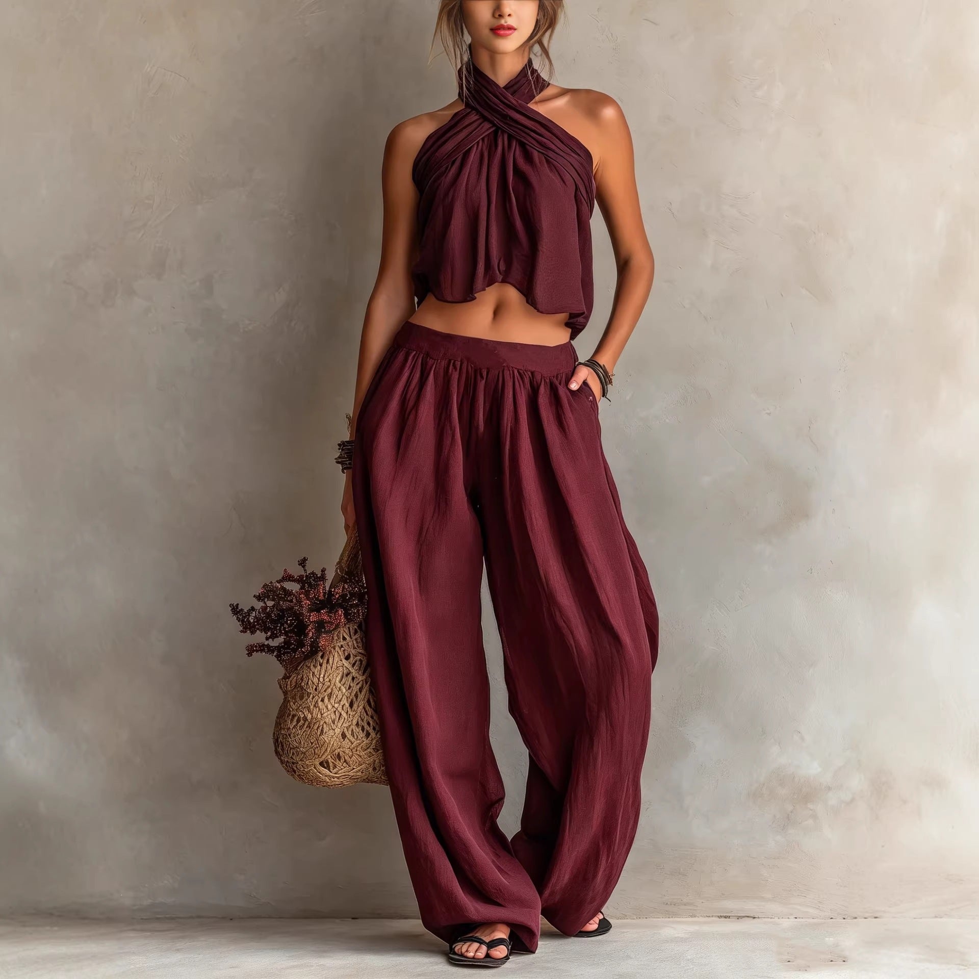 Women's sleeveless linen-blend top and wide-leg pants set by FitiqueFit, casualwear with relaxed fit and breathable fabric.