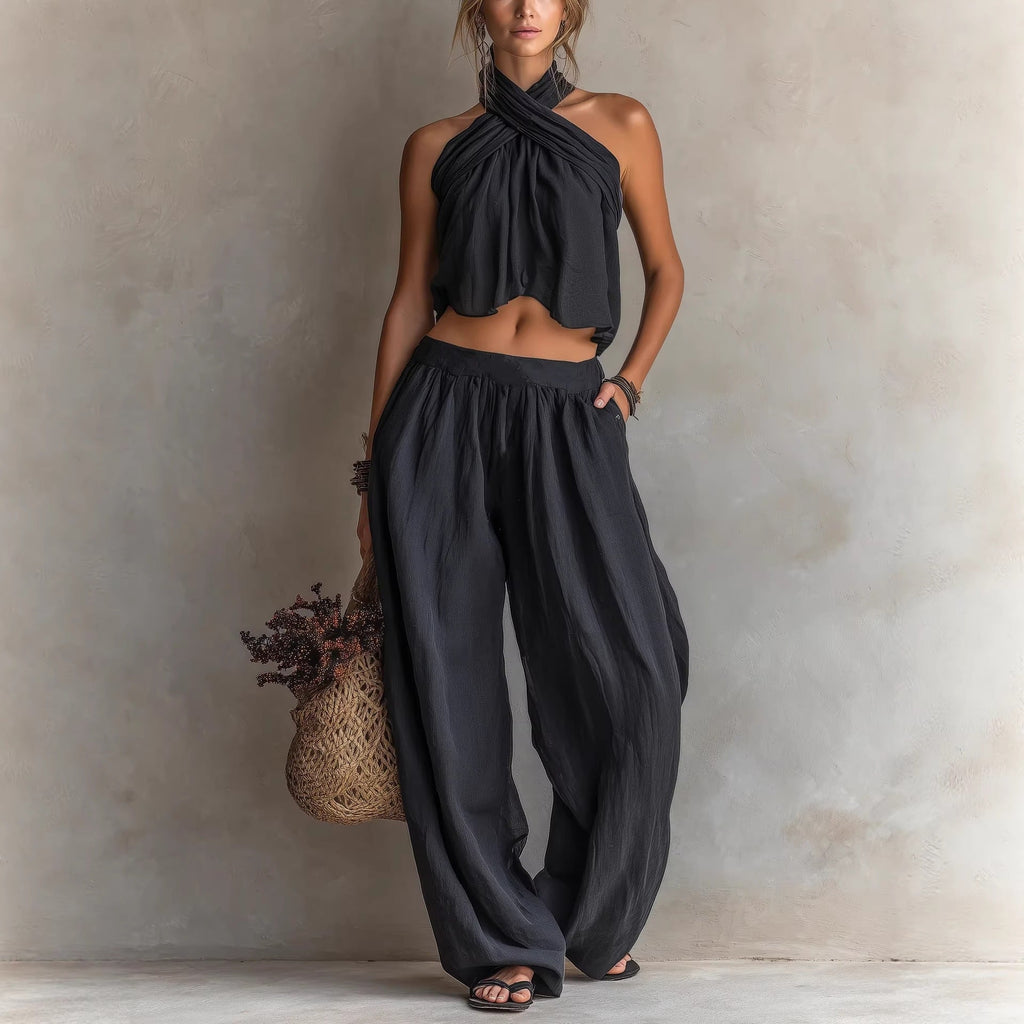 Women's linen blend sleeveless top and wide-leg pants set, casualwear by FitiqueFit, shown on a model.