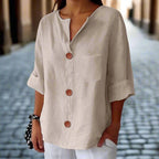 Women’s loose V-neck T-shirt by FitiqueFit, made of cotton linen fabric with button details, casual women's top.