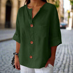 Women’s loose V-neck T-shirt by FitiqueFit, made of cotton linen, featuring a button-front design and casual, comfortable fit.