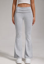 Women's low-waisted fold-over flared pants by FitiqueFit, casual wide-leg trousers with a relaxed fit and folded waistband.