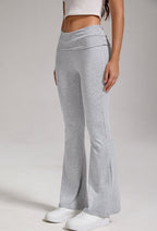 Women's low-waisted flared pants with folded waist and wide-leg style, casualwear by FitiqueFit, shown in natural fabric and fit.