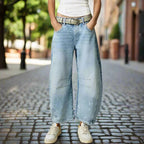Women’s mid-rise wide-leg jeans by FitiqueFit, casualwear style, showcasing the relaxed fit and classic denim look.