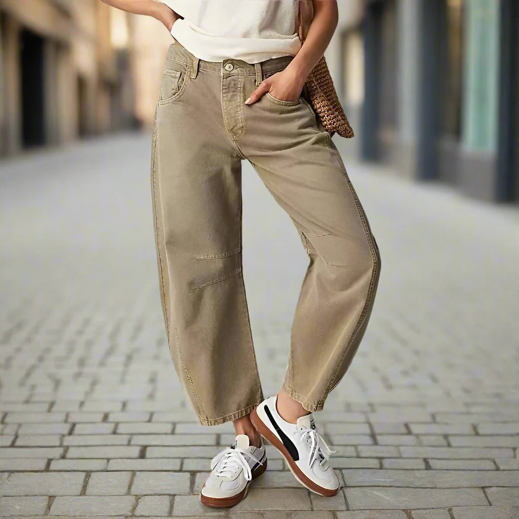 Women’s mid-rise wide-leg jeans by FitiqueFit, casualwear style, showing the relaxed fit and classic denim fabric.