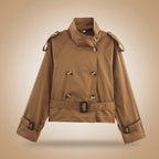 Women's short trench coat with notch collar and belt buckle detail, stylish FitiqueFit jacket for a polished look.