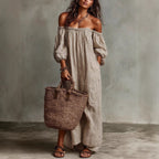 Women's off-shoulder long-sleeve maxi dress by FitiqueFit, casualwear style with flowing fabric and elegant neckline.