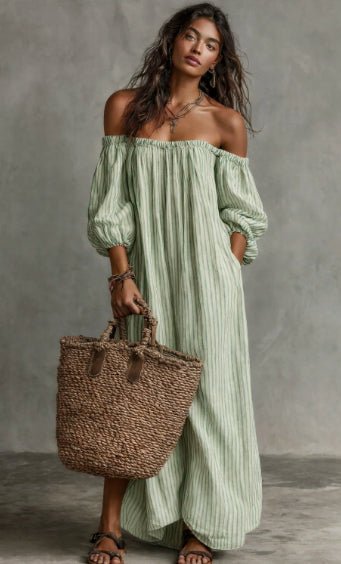 Women's off-shoulder long-sleeve maxi dress by FitiqueFit, casualwear style with flowing fabric and elegant neckline.