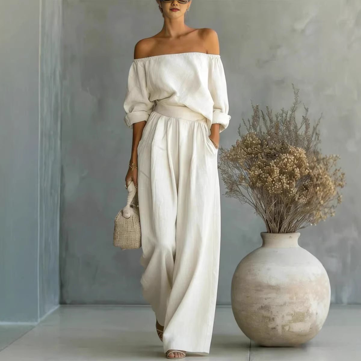 Women's off-shoulder long-sleeve top and wide-leg pants two-piece casualwear set by Plush Fashion Hub, styled for a relaxed look.