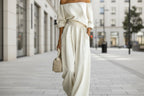 Women’s off-shoulder long-sleeve top and wide-leg pants two-piece casualwear set by Plush Fashion Hub, styled together.