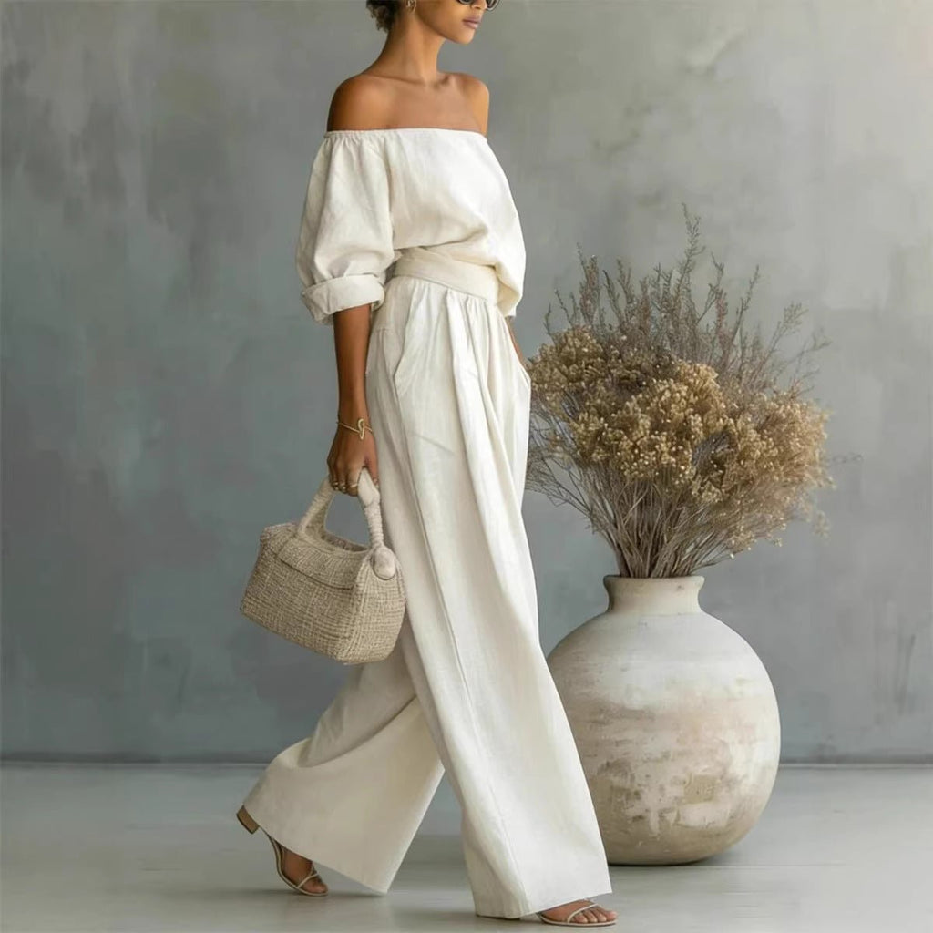 Women's off-shoulder long-sleeve top and wide-leg pants two-piece casualwear set by Plush Fashion Hub, styled on a model.