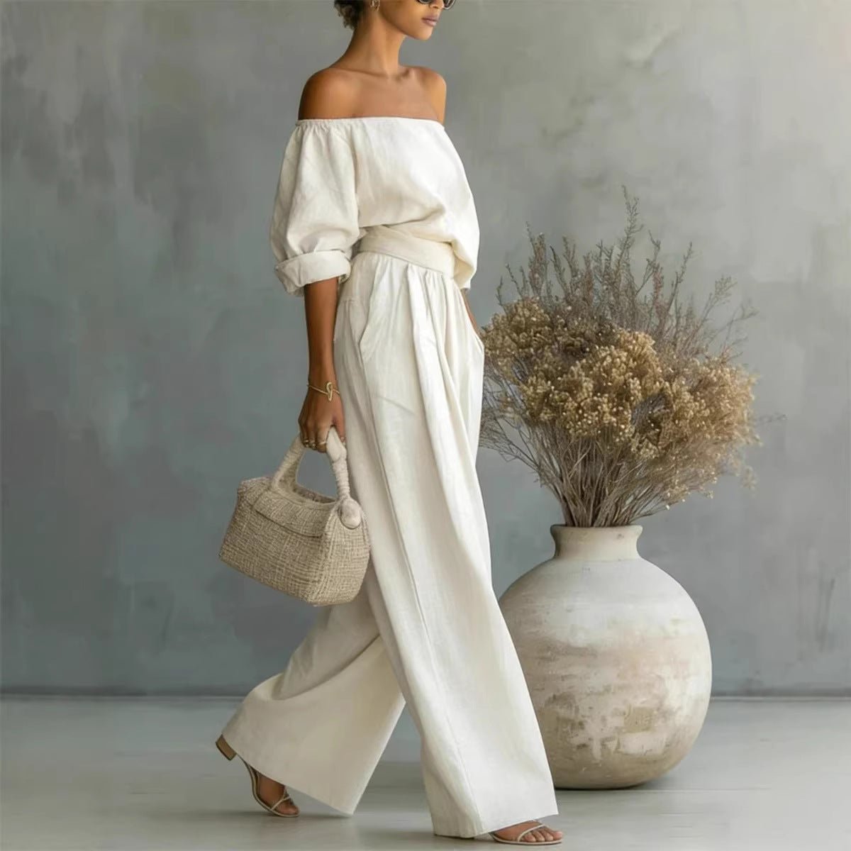 Women's off-shoulder long-sleeve top and wide-leg pants two-piece casualwear set by Plush Fashion Hub, styled on a model.