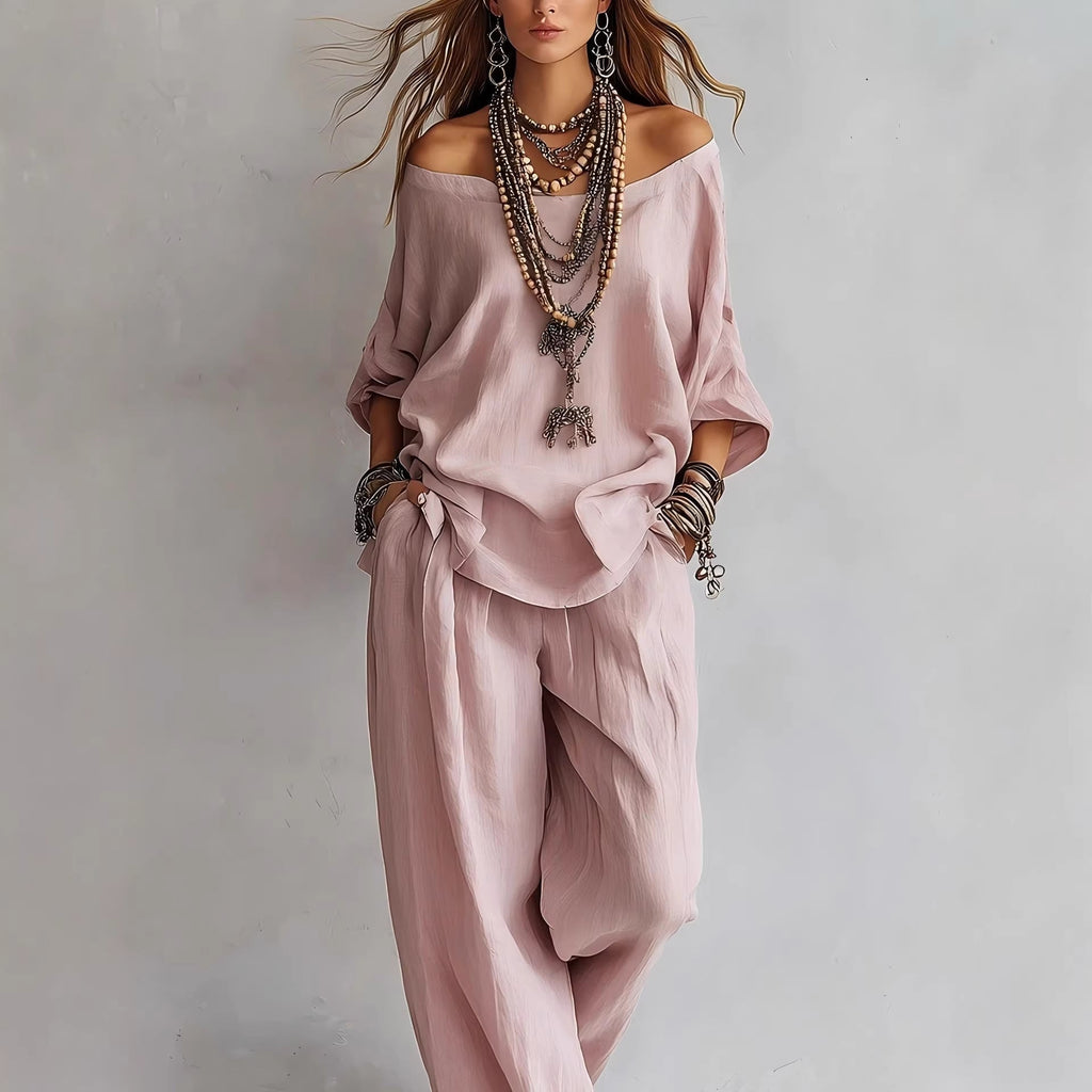 Women's off-shoulder top and wide-leg pants casualwear set by FitiqueFit, featuring a stylish off-shoulder blouse and flowing pants.