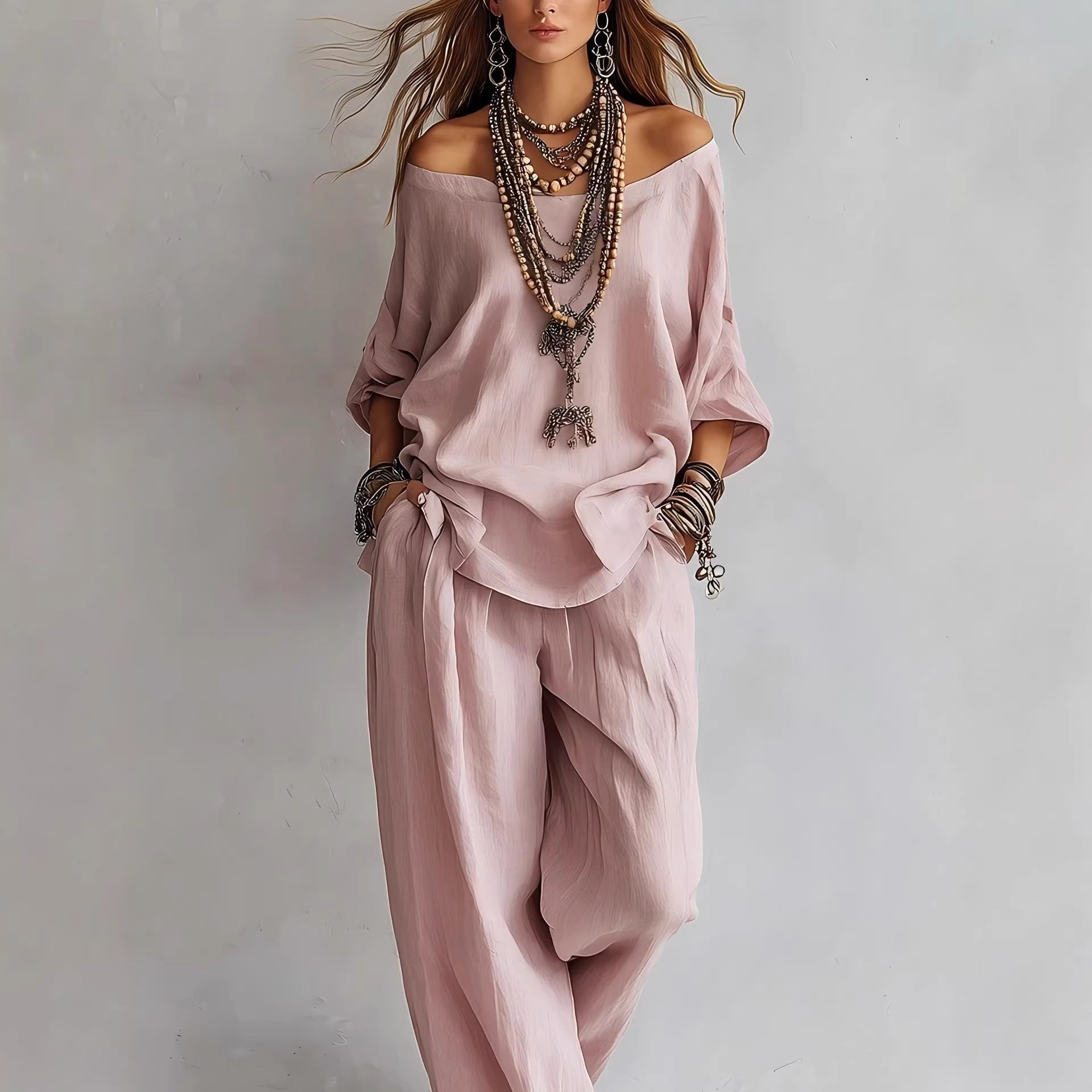 Women's off-shoulder top and wide-leg pants casualwear set by FitiqueFit, featuring a stylish off-shoulder blouse and flowing pants.