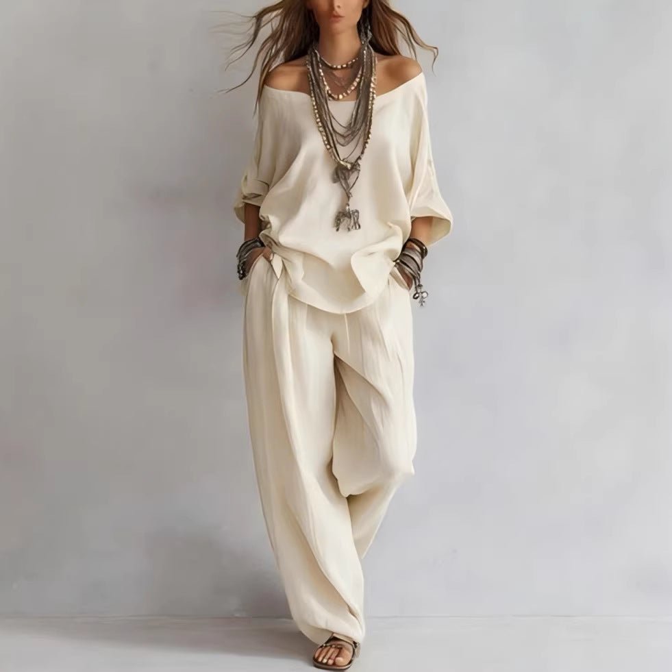 Women's off-shoulder top and wide-leg pants casualwear set by FitiqueFit, featuring a stylish off-shoulder neckline and relaxed fit.