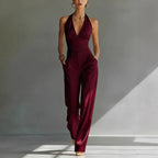 Women's high-waisted casual trousers with lace backless design and deep V neckline by FitiqueFit, styled as a chic one-piece outfit.