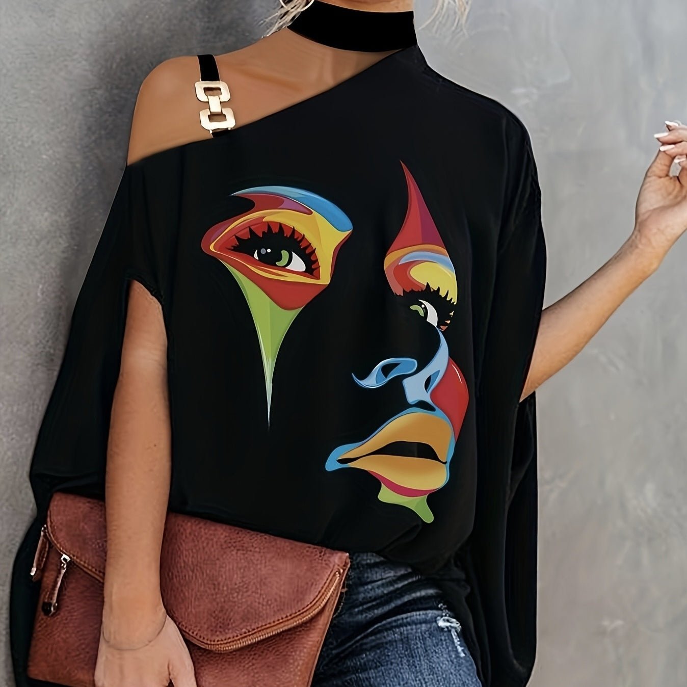 Women’s one-shoulder printed T-shirt by FitiqueFit, casualwear top with bold pattern and relaxed fit, displayed on a mannequin.