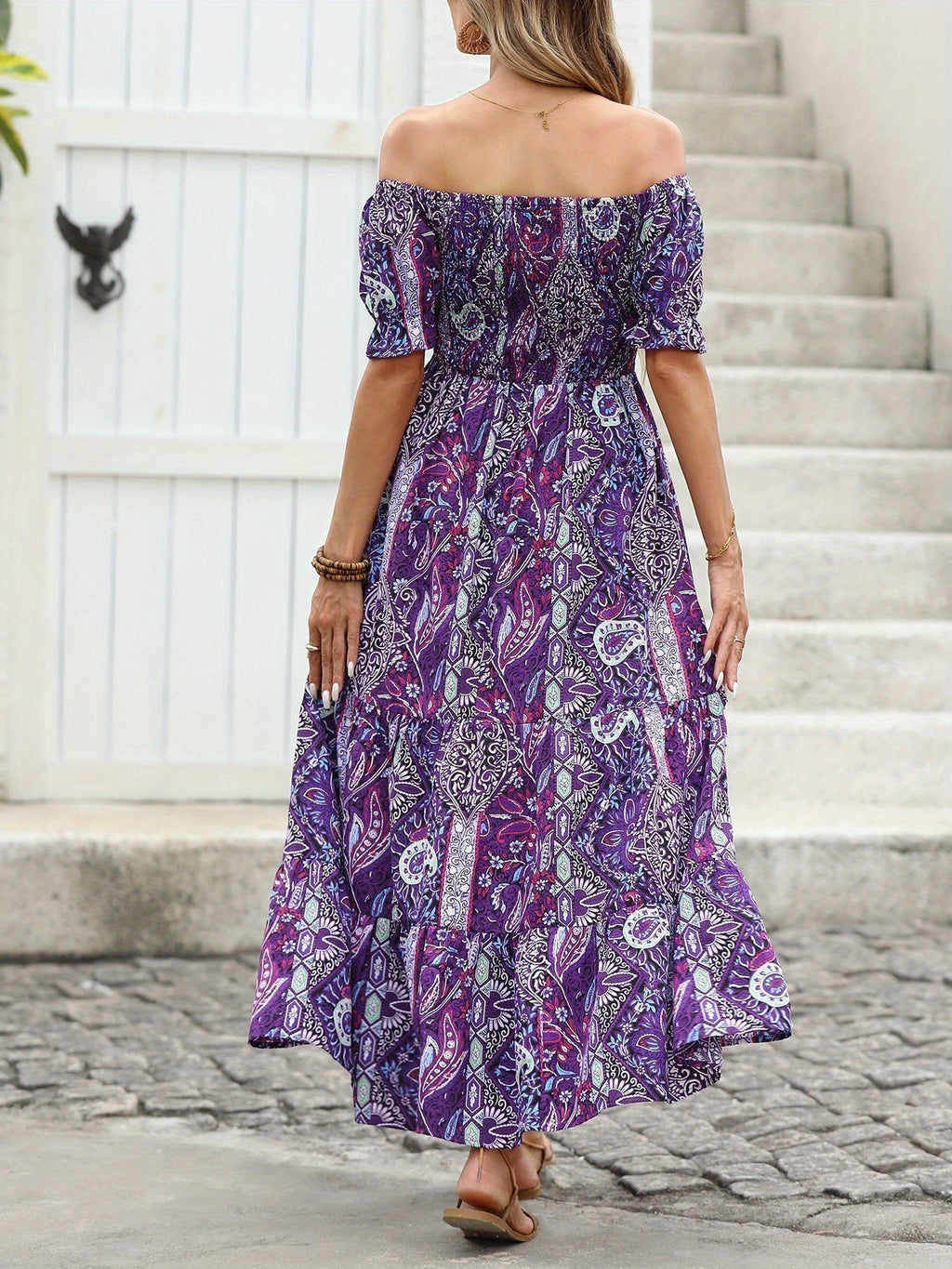 Women’s paisley one-shoulder maxi dress by FitiqueFit, casualwear style, featuring flowing fabric and elegant design.