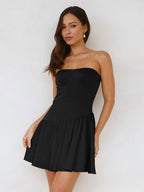 Women's pleated color block tube top dress by FitiqueFit, casualwear style, featuring a fitted bodice and vibrant color blocking.