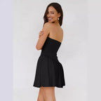 Women's pleated color block tube top dress by FitiqueFit, casualwear style with a fitted bodice and vibrant color blocking.