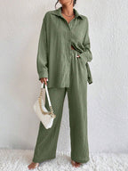 Women's pleated long sleeve lapel two-piece set by FitiqueFit, featuring a loose top and matching pants for casual wear.