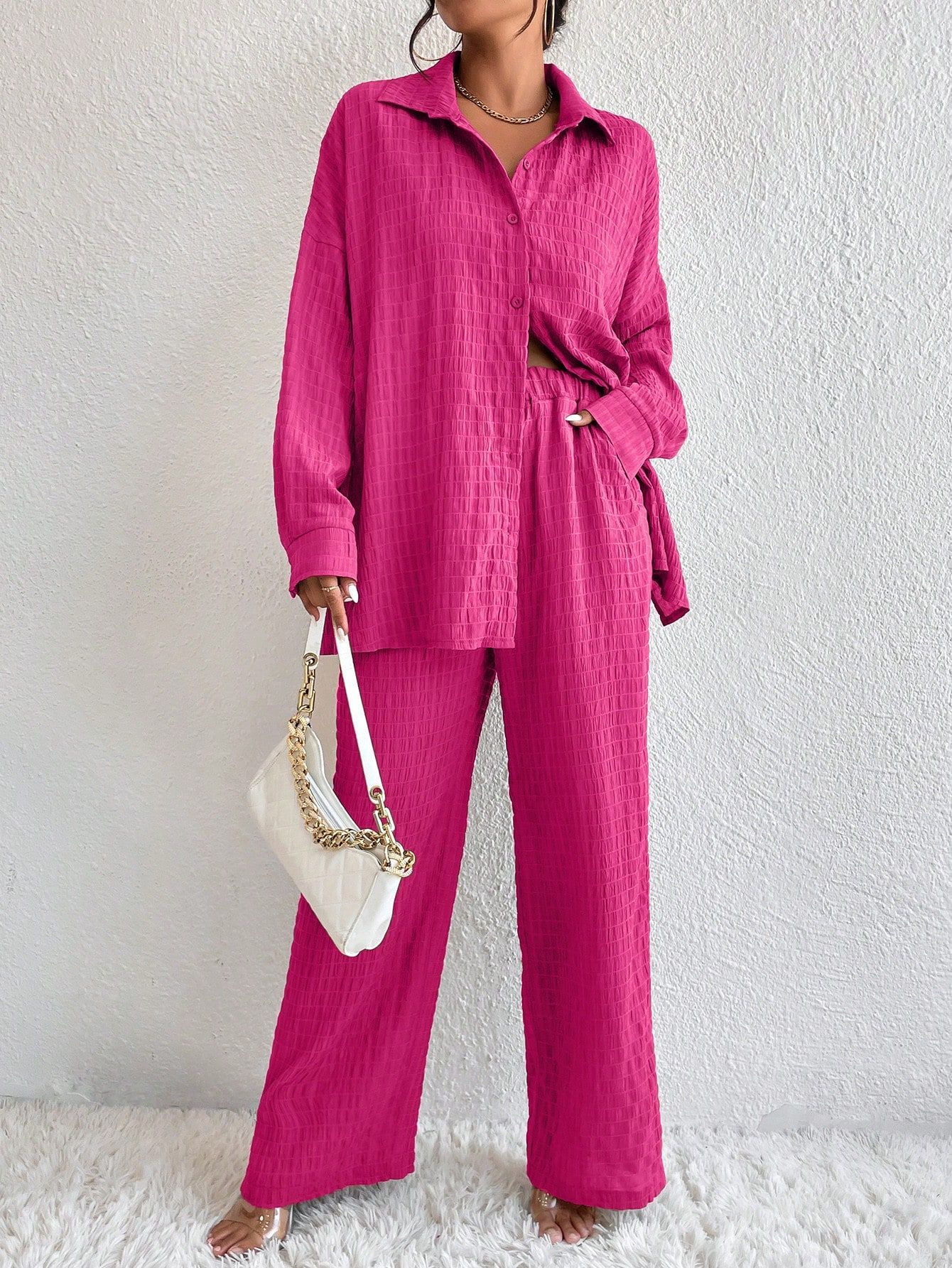 Women's pleated long sleeve lapel two-piece set by FitiqueFit, featuring a loose top and matching pants in casual wear style.