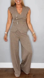 Women's pleated vest and pants casualwear set by FitiqueFit with metal buckle detail, featuring a stylish and comfortable design.
