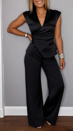 Women's pleated vest and pants set by FitiqueFit featuring metal buckle details, casualwear style with a coordinated, stylish look.