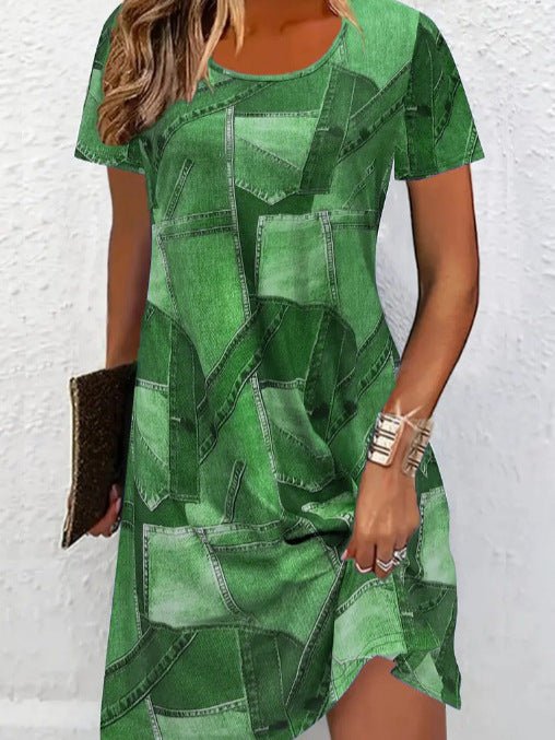 Plus size women's digital print denim-look short sleeve dress by FitiqueFit, casualwear, shown on a model.