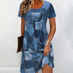 Plus size women's digital print denim-look short sleeve dress by FitiqueFit, casualwear style, shown with a relaxed fit and vibrant print.