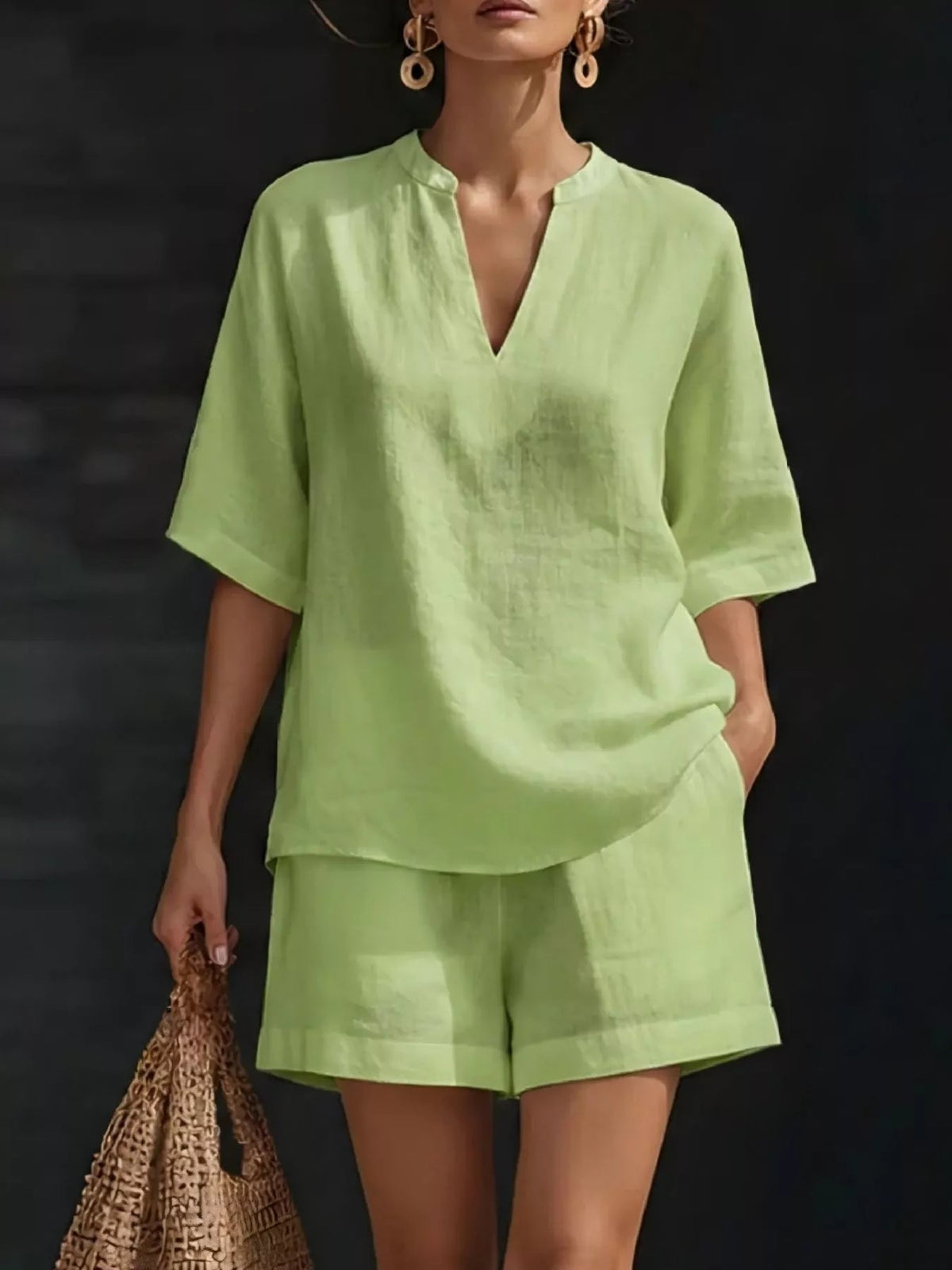 Plus size women's lounge set with notched collar half-sleeve top and matching shorts, soft and comfortable clothing set.